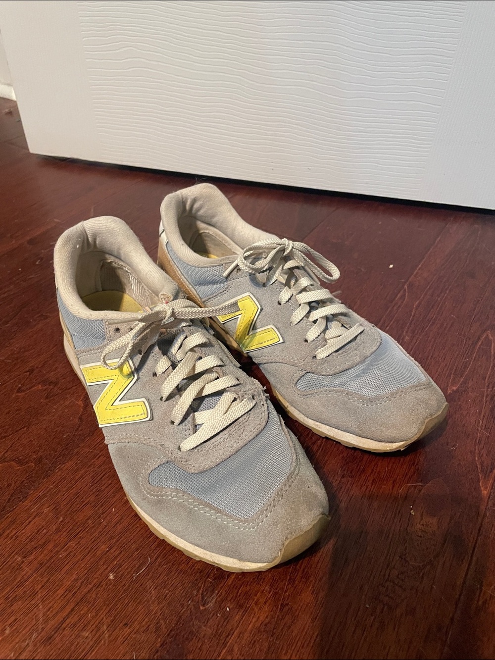 New Balance 696 Gray and Yellow Sneakers